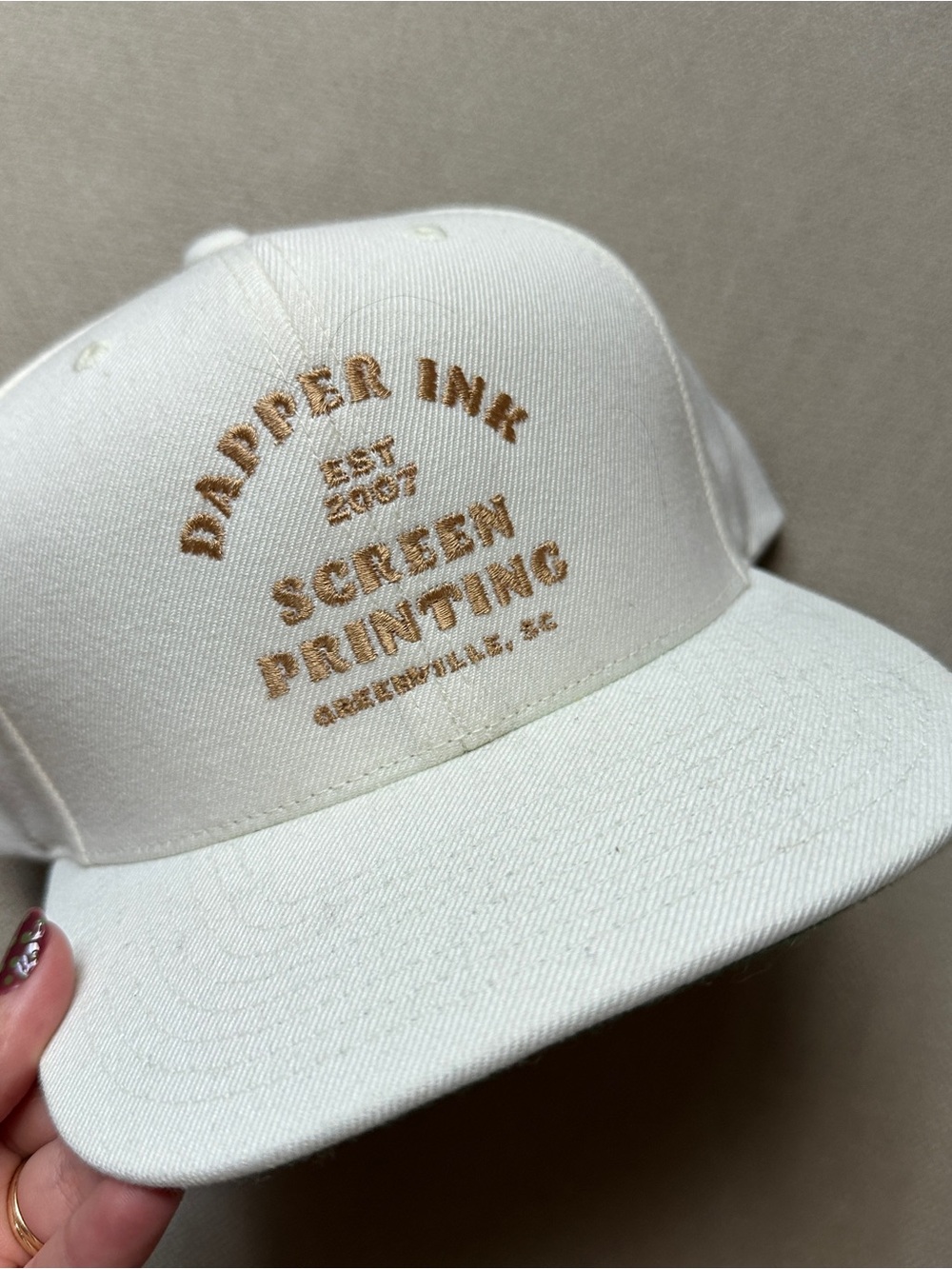The Classic Cream Cap with Tan Embroidered Logo